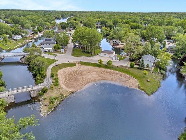 75 Largemouth Ln, Wilmington, IL 60481 - view of property location with a heavily wooded area and a nearby body of water