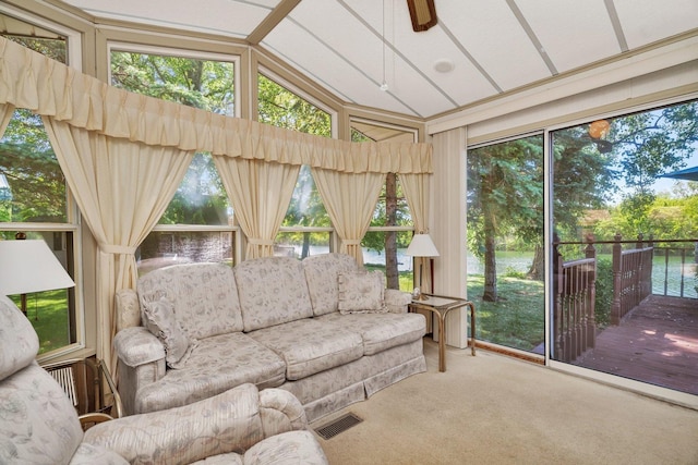 75 Largemouth Ln, Wilmington, IL 60481 - sunroom / solarium featuring carpet floors, lofted ceiling, plenty of natural light, and a wooden deck