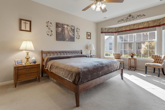 12183 Wildflower Ln, Huntley, IL 60142 - bedroom featuring light colored carpet, baseboards, and ceiling fan