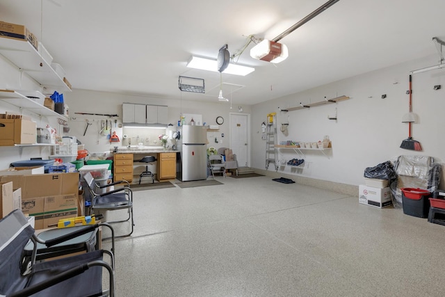 12183 Wildflower Ln, Huntley, IL 60142 - garage with freestanding refrigerator, a garage door opener, and a workshop area