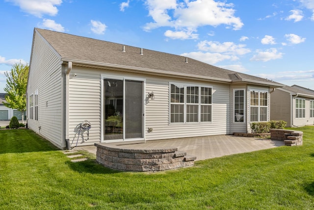 12183 Wildflower Ln, Huntley, IL 60142 - rear view of house with a patio and a yard
