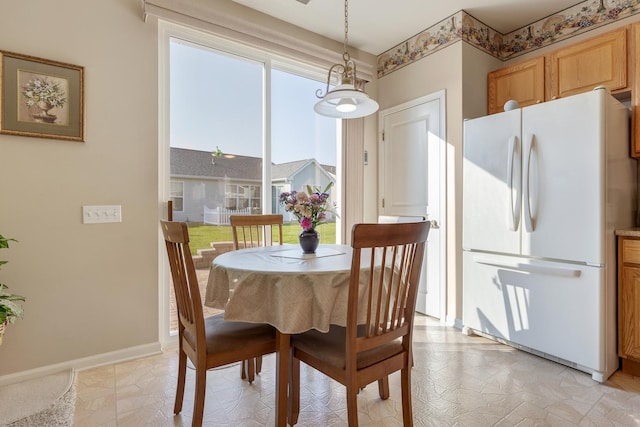12183 Wildflower Ln, Huntley, IL 60142 - dining area with baseboards