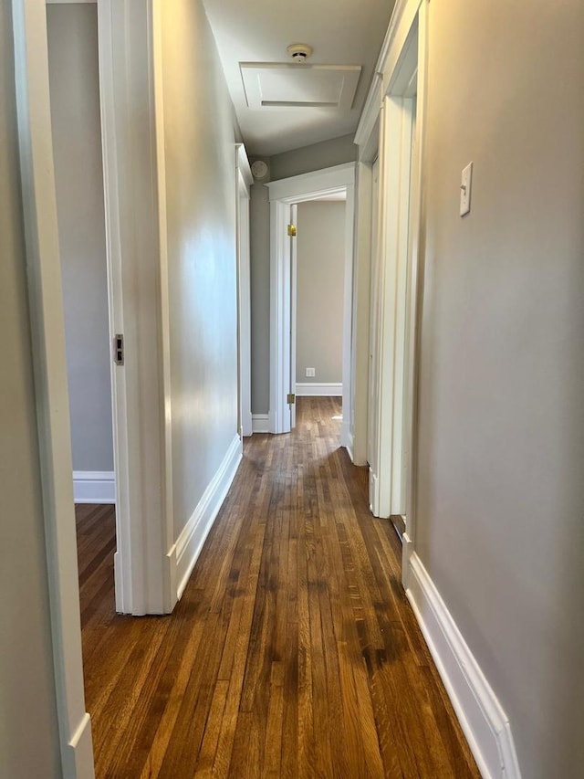 407 N William St, Joliet, IL 60435 - corridor with attic access, dark wood-style flooring, and baseboards