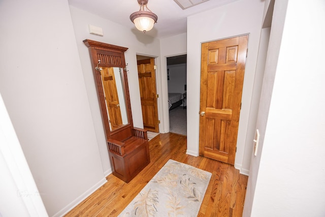405 Farmington Ave, Joliet, IL 60435 - hallway featuring light wood-style flooring and baseboards