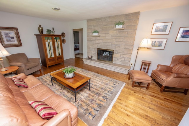 405 Farmington Ave, Joliet, IL 60435 - living area with wood finished floors and a fireplace