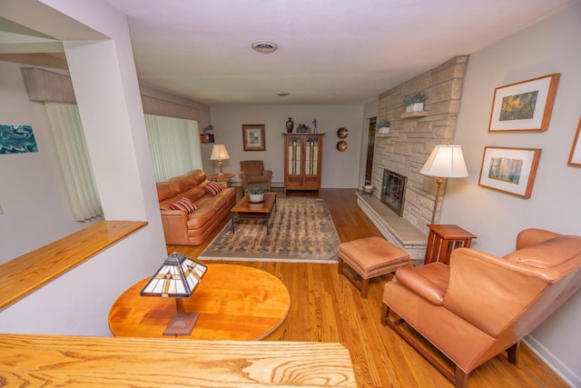 405 Farmington Ave, Joliet, IL 60435 - living room with wood finished floors and a fireplace