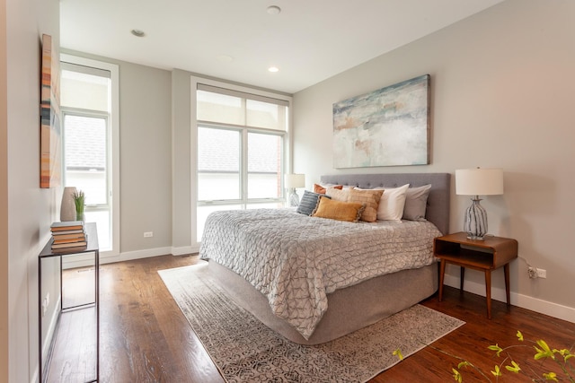 2823 N Oakley Ave Unit K, Chicago, IL 60618 - bedroom featuring wood finished floors, multiple windows, baseboards, and recessed lighting