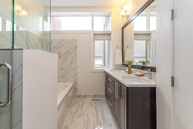 2823 N Oakley Ave Unit K, Chicago, IL 60618 - bathroom with double vanity, marble finish flooring, a bathtub, and a shower