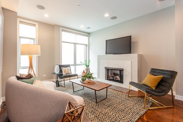 2823 N Oakley Ave Unit K, Chicago, IL 60618 - living room featuring wood finished floors, baseboards, recessed lighting, and a tile fireplace