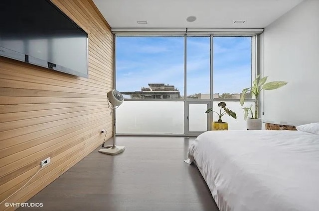 2157 W Division St Unit 401, Chicago, IL 60622 - bedroom featuring floor to ceiling windows and wooden walls
