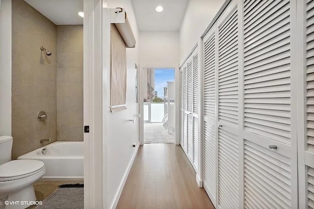 2157 W Division St Unit 401, Chicago, IL 60622 - hallway with wood finished floors, baseboards, and recessed lighting