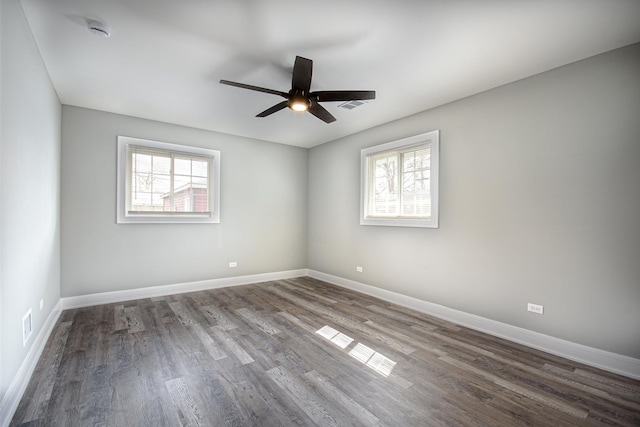 34 W 142nd St, Harvey, IL 60426 - spare room with plenty of natural light and wood finished floors