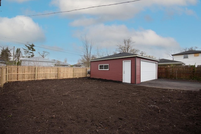 34 W 142nd St, Harvey, IL 60426 - detached garage with asphalt driveway