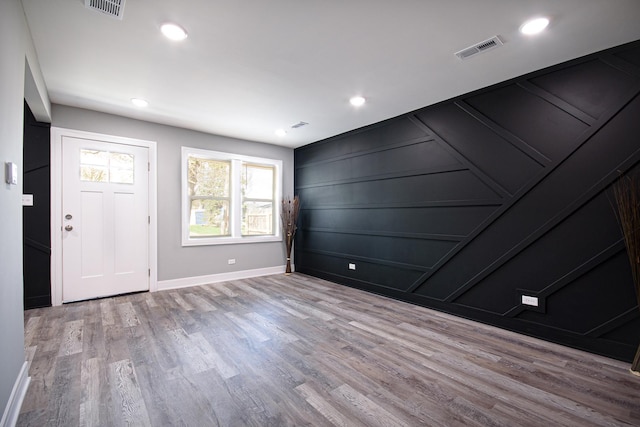 34 W 142nd St, Harvey, IL 60426 - spare room with wood finished floors, baseboards, and recessed lighting