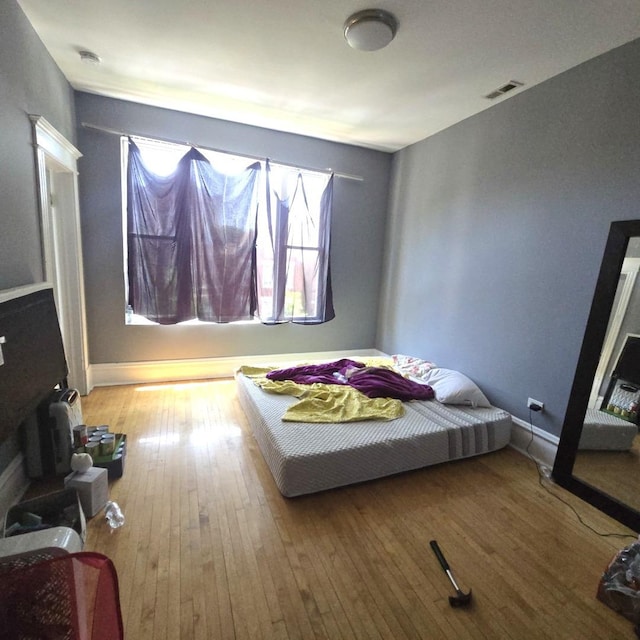2322 S Trumbull Ave, Chicago, IL 60623 - bedroom featuring hardwood / wood-style floors and baseboards