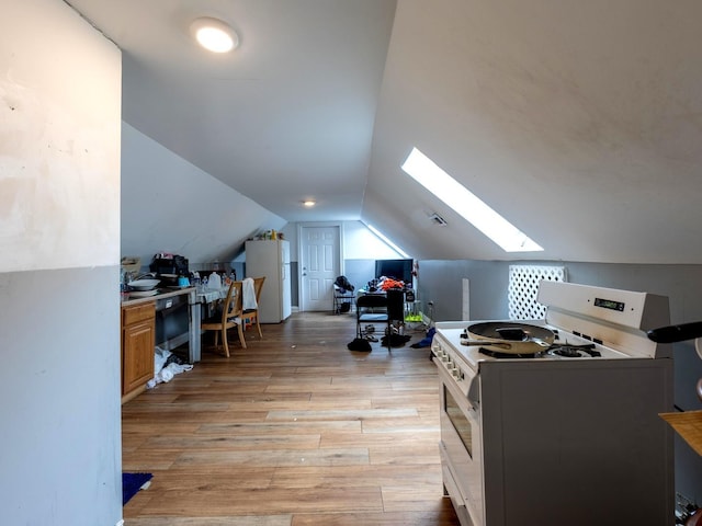 2322 S Trumbull Ave, Chicago, IL 60623 - office with a skylight, light wood-type flooring, and lofted ceiling
