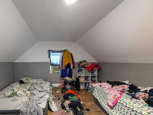 2322 S Trumbull Ave, Chicago, IL 60623 - bedroom with wood finished floors, vaulted ceiling, and cooling unit