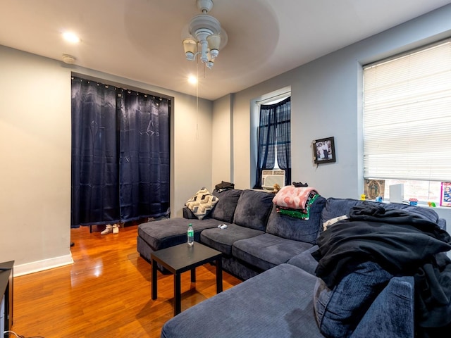 2322 S Trumbull Ave, Chicago, IL 60623 - living room featuring a ceiling fan, wood finished floors, and cooling unit