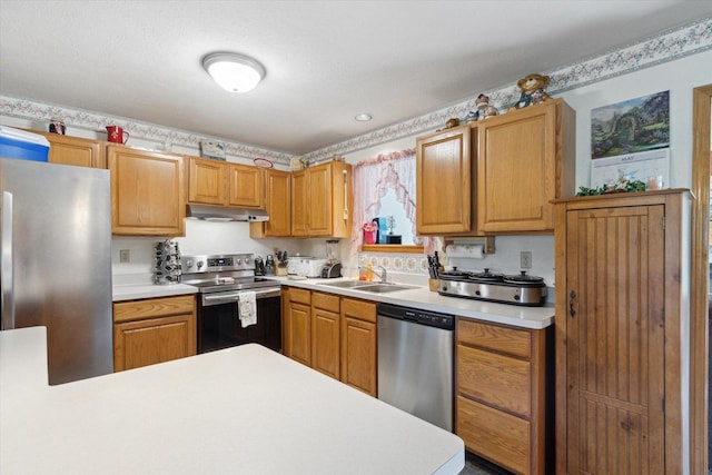 5057 Kasch Rd, Pecatonica, IL 61063 - kitchen featuring stainless steel appliances, a sink, and light countertops