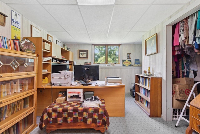 5057 Kasch Rd, Pecatonica, IL 61063 - home office featuring a paneled ceiling, carpet floors, and wood walls