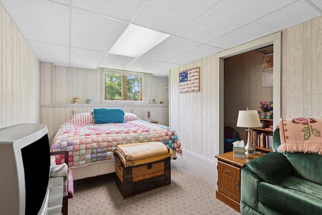 5057 Kasch Rd, Pecatonica, IL 61063 - carpeted bedroom with wood walls and a drop ceiling