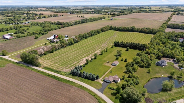 5057 Kasch Rd, Pecatonica, IL 61063 - overview of rural landscape with large plots for crops and a nearby body of water