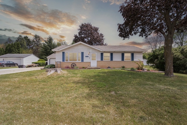 2383 Prairie Ave, Beloit, WI 53511 - ranch-style home with driveway, a front yard, brick siding, and an attached garage