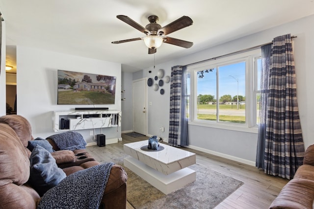 2383 Prairie Ave, Beloit, WI 53511 - living room with ceiling fan, light wood-type flooring, and baseboards