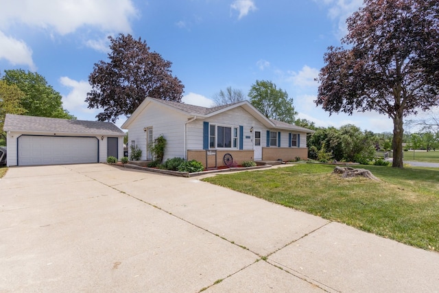 2383 Prairie Ave, Beloit, WI 53511 - single story home featuring a garage, a front yard, brick siding, and an outdoor structure