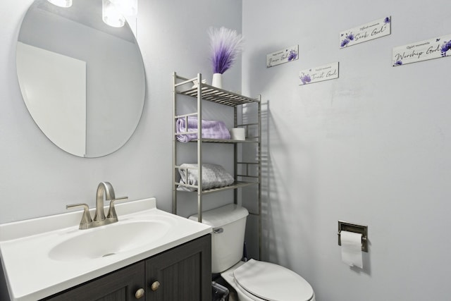 2383 Prairie Ave, Beloit, WI 53511 - half bathroom featuring toilet and vanity
