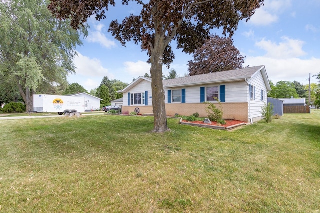 2383 Prairie Ave, Beloit, WI 53511 - single story home with brick siding and a front lawn