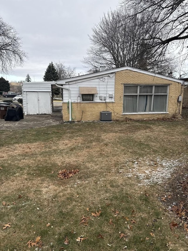 17222 Country Ln, Hazel Crest, IL 60429 - view of grassy yard with central AC unit