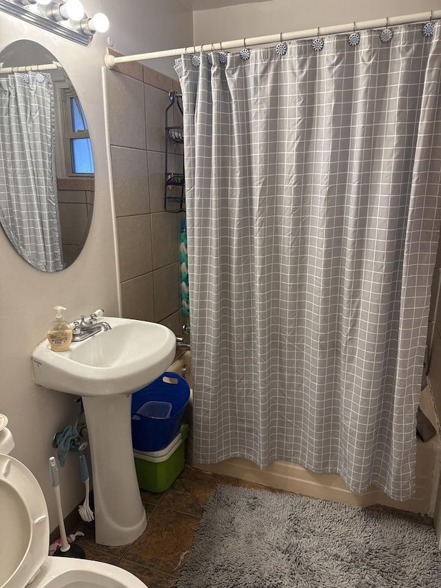 17222 Country Ln, Hazel Crest, IL 60429 - full bath with shower / bath combo with shower curtain, toilet, a sink, and tile patterned floors