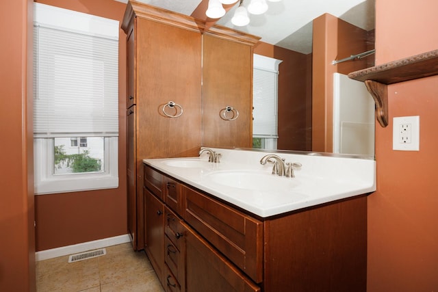 1313 S Madison St, Bloomington, IL 61701 - full bath featuring double vanity and baseboards
