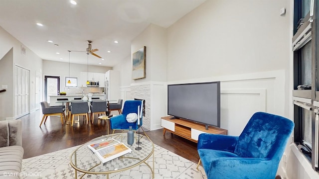2330 W Armitage Ave Unit B, Chicago, IL 60647 - living area featuring a fireplace, a ceiling fan, wood finished floors, and recessed lighting