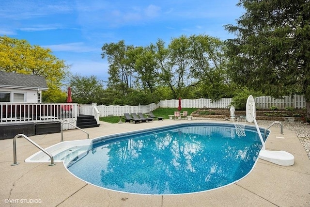 1302 Moraine Dr, Woodstock, IL 60098 - view of swimming pool featuring a deck, a fenced backyard, and a patio