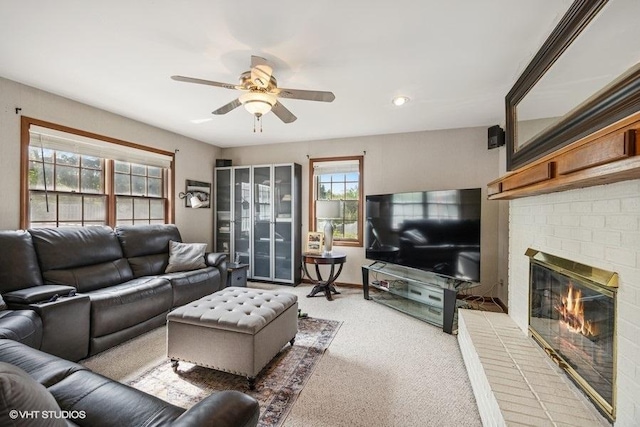 1302 Moraine Dr, Woodstock, IL 60098 - living room featuring a ceiling fan, a brick fireplace, light carpet, and recessed lighting