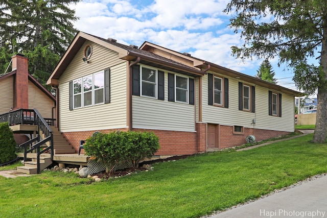 24991 W Forest Dr, Lake Villa, IL 60046 - view of side of property with a yard, stairs, and brick siding