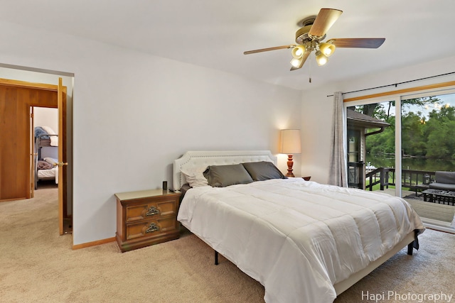 24991 W Forest Dr, Lake Villa, IL 60046 - bedroom featuring light carpet, access to outside, ceiling fan, and baseboards