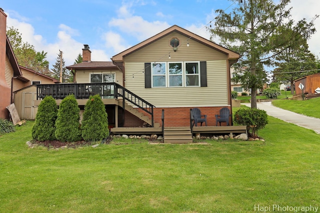 24991 W Forest Dr, Lake Villa, IL 60046 - back of house featuring a deck, a chimney, a yard, and stairs