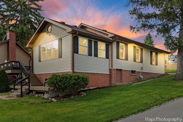 24991 W Forest Dr, Lake Villa, IL 60046 - view of front facade featuring a lawn and stairs
