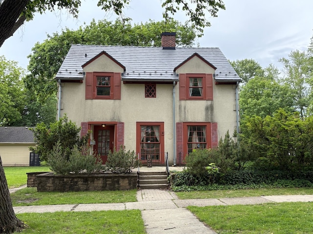 128 W 8th Ave, Naperville, IL 60563 - view of front facade with stucco siding, a chimney, a front yard, and a porch