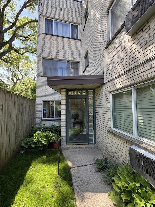7070 N Ridge Blvd Unit 1B, Chicago, IL 60645 - property entrance with brick siding