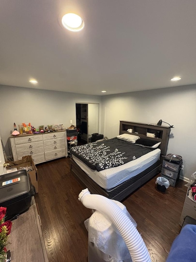 7070 N Ridge Blvd Unit 1B, Chicago, IL 60645 - bedroom with dark wood finished floors and recessed lighting