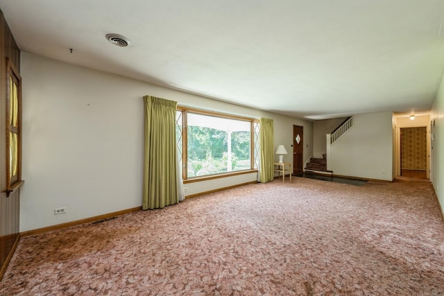 4N051 Wood Dale Rd, Addison, IL 60101 - unfurnished living room featuring stairway and carpet flooring