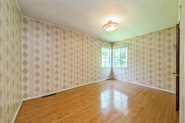 4N051 Wood Dale Rd, Addison, IL 60101 - unfurnished room featuring wood finished floors and baseboards