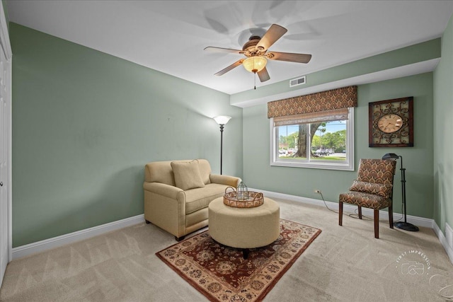 1103 N Mill St Unit 111, Naperville, IL 60563 - sitting room featuring carpet flooring, baseboards, and ceiling fan
