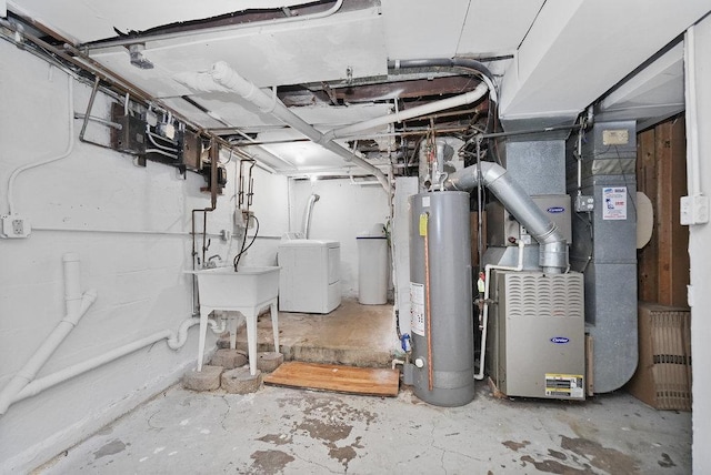 8 Manor Ct, Joliet, IL 60436 - unfinished below grade area with gas water heater, heating unit, and washer and clothes dryer