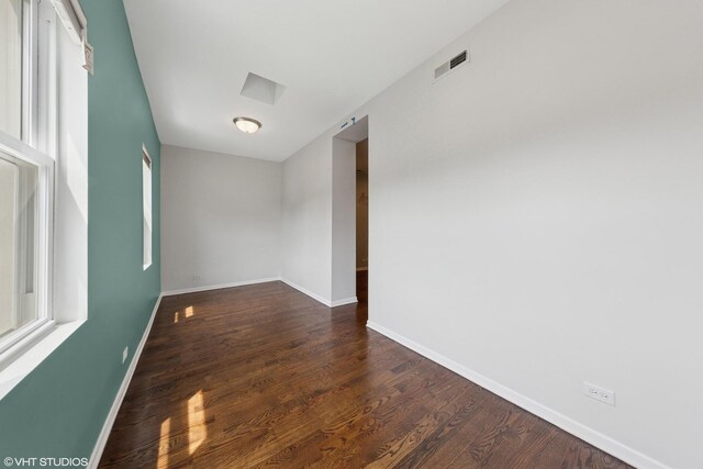 1933 W 22nd Pl, Chicago, IL 60608 - unfurnished room featuring dark wood-type flooring