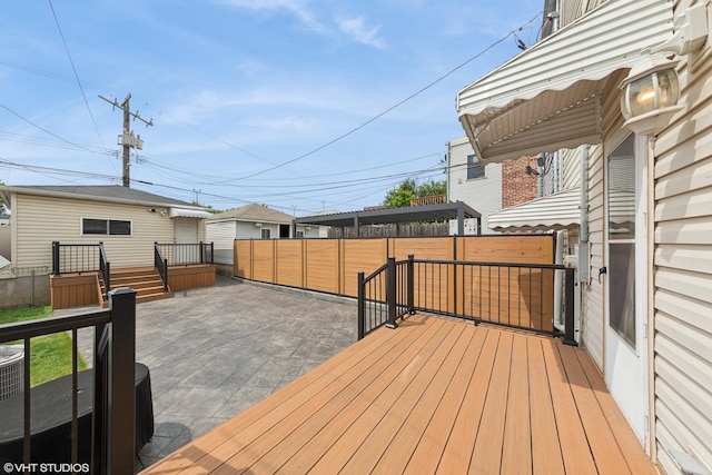 1933 W 22nd Pl, Chicago, IL 60608 - wooden terrace with a fenced backyard and a patio area